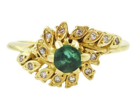 18ct gold emerald and diamond crossover cluster ringCondition Report:Approx 4.15gm, size P, tested 18ct, slight thinning and 