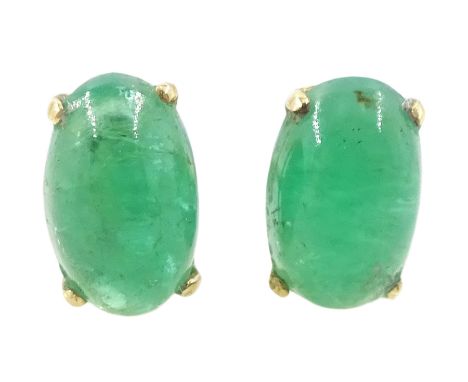 Pair of 9ct gold cabochon emerald stud earrings, stampedCondition Report:Approx 0.35gm, head = 5mm, x 3mm, good condition