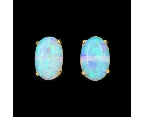 Pair of 9ct gold opal stud earrings, stampedCondition Report:Approx 0.35gm, head = 6mm x 4mm, good condition