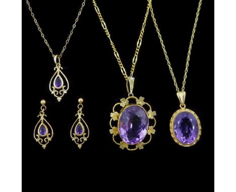 Early 20th century gold amethyst and seed pearl pendant, stamped 9ct, on later gilt chain, two later 9ct amethyst pendant nec