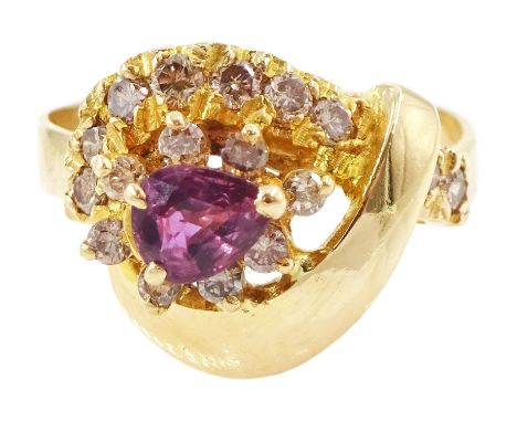 18ct gold pear cut ruby and round brilliant cut fancy light brown diamond crossover ring, hallmarkedCondition Report:Approx 4