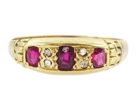 Early 20th century 18ct gold three stone oval cut ruby and four stone rose cut diamond ring, Birmingham 1915Condition Report: