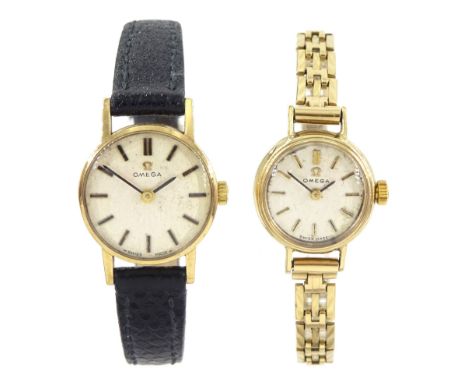 Omega two ladies 9ct gold manual wind wristwatches, on one 9ct gold bracelet, the other on a leather strapCondition Report:Ap