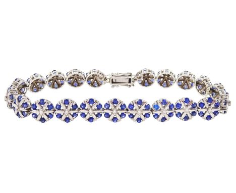 9ct white gold round cut sapphire and diamond cluster link bracelet, hallmarkedCondition Report:Approx 16.1gm, length = 19cm,