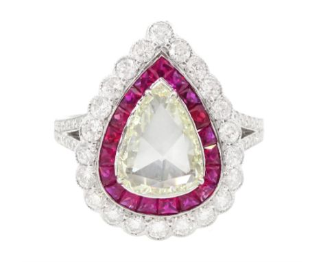 18ct white gold diamond and ruby cluster ring, the principal pear rose cut diamond of approx 1.30 carat, with calibre cut rub