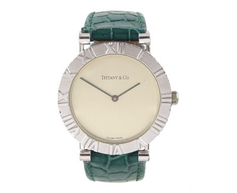 Tiffany & Co. Atlas silver quartz presentation wristwatch, D286753, silvered dial with Roman numeral bezel, on green leather 