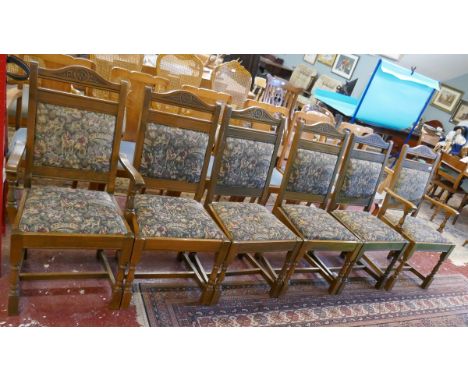Set of 6 oak dining chairs with tapestry upholstery to include two carvers by Old Charm 