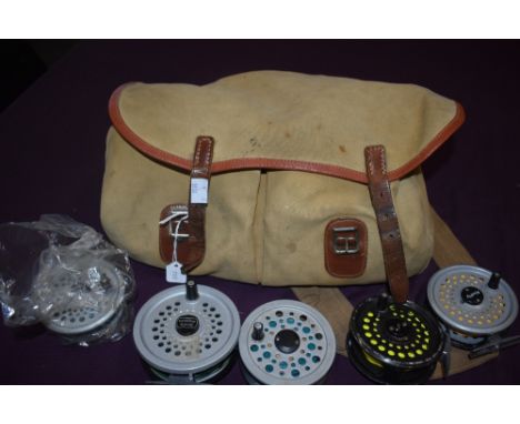 A Brady fishing bag containing 3 vintage fly reels 2 x rimfly and 1 x shakespeare