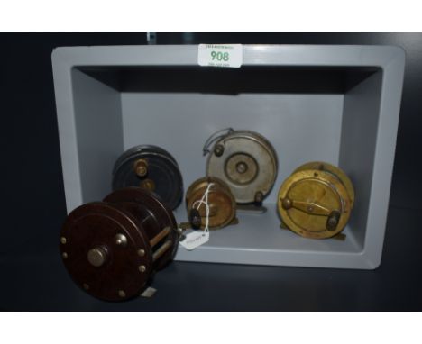 Four vintage fishing reels  including two brass one by Milbro and another small trotting reel