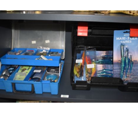 Two hand held tackle boxes containing mixed tackle including jelly lures and a lot of large weights