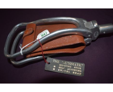 An automatic shooting stick self adjusting with swivel head