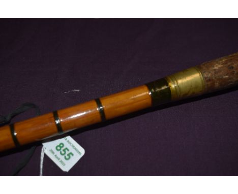 A 15ft 3pc split cane salmon fly rod by J S Walker of Alnwick with a spare tip in good used condition