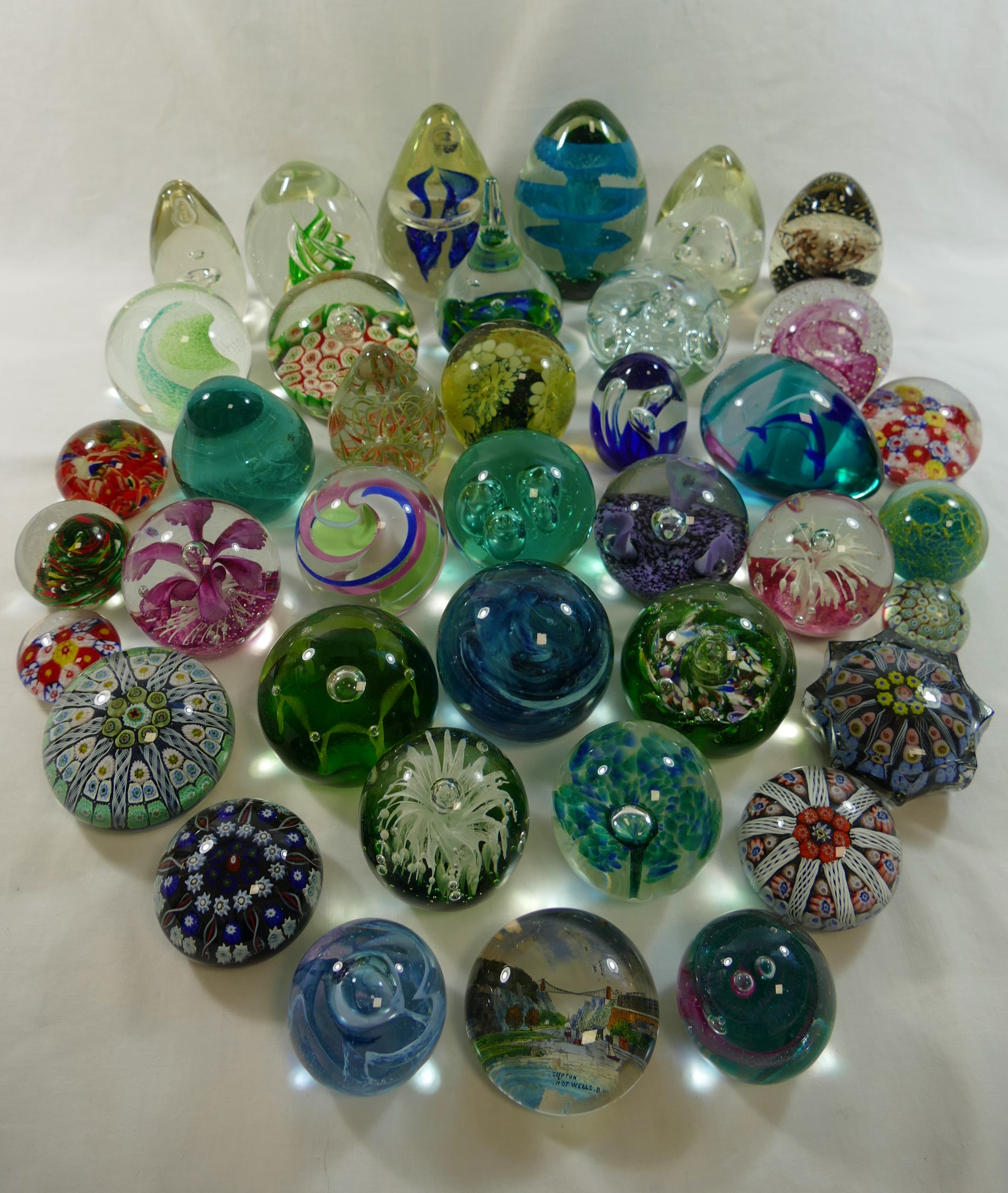 A collection of 39 paperweight including a limited edition Caithness