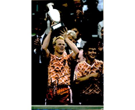 Ronald Koeman signed 10x8 inch colour photo pictured celebrating with the European Championship trophy while playing for the 