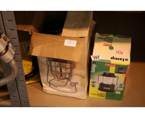 boxed Tilley storm light and Coleman battery opp lamp 