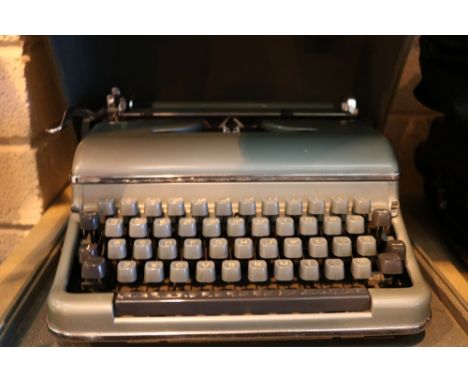 Bluebird typewriter in carry case 