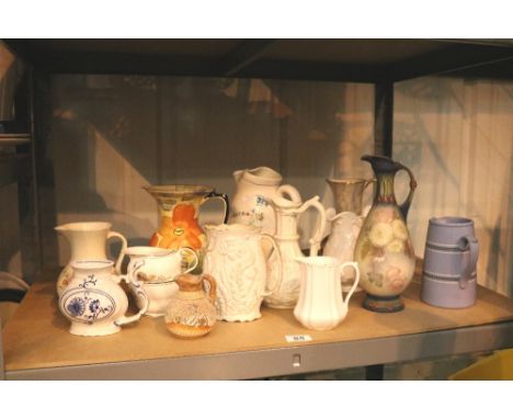 Shelf of ceramic jugs 