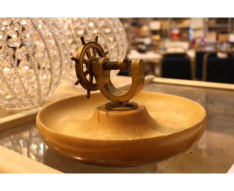 Vintage nut cracker in the form of a ships wheel 