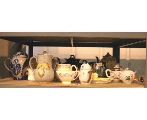 Selections of jugs and teapots including Suzi Cooper and Carltonware 