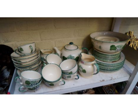 A Poole pottery 'hand-painted' part tea and dinner service.    Condition Report:  This set has been used so there is some lig