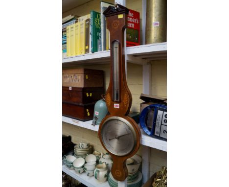 An Edwardian mahogany and inlaid wheel barometer, the 8 inch silvered dial inscribed 'J Somalvico, Brook St, Holborn, London'