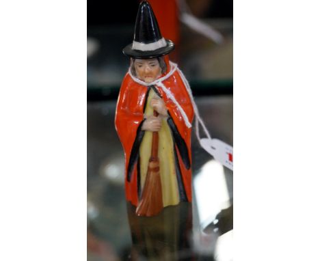 A Royal Worcester candle snuffer figure of 'The Witch', circa 1922.