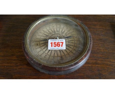 A Georgian mahogany cased circular compass, 13.5cm diameter. 