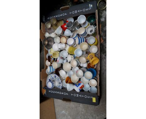 A collection of ceramic egg cups. 