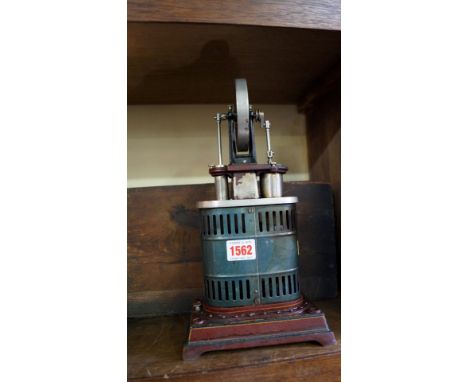 A vintage stationary steam engine, in pine box, the engine 30.5cm high. 