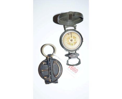 A military style lacquered brass pocket compass; and another similar. (2)