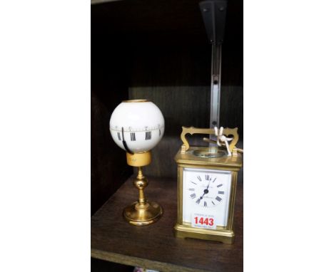 An Imhof rotating globe timepiece, 17.5cm high; together with another old brass carriage timepiece, the dial inscribed 'Jacks