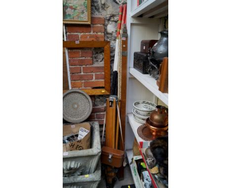 A 'Hilger & Watts' surveyor's level, in case with tripod; telescopic rule; and six range rods. 