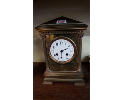 A late 19th century brass mantel clock, of architectural form, with enamel dial, 26.5cm high. 