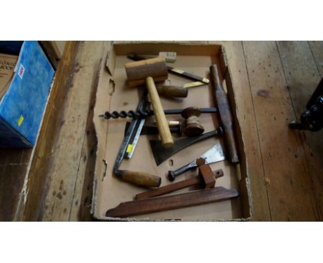 Tools: a collection of Shipwright's tools, to include: caulking irons, by Mathieson; a brass plumb bob; a draw knife; a bevel
