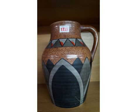 An Art Deco Wilkinson pottery jug, in Clarice Cliff style, 29cm high, (s.d.).