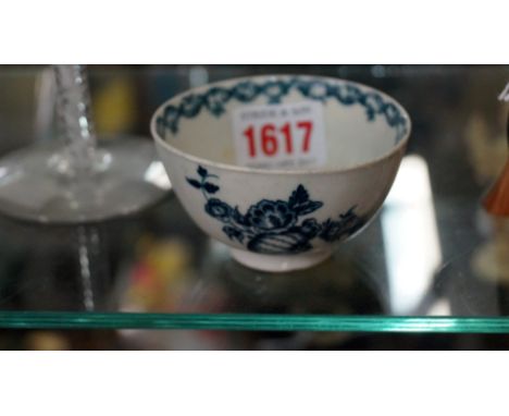 A Worcester first period blue and white teabowl, painted with flowers, 7.9cm diameter.
