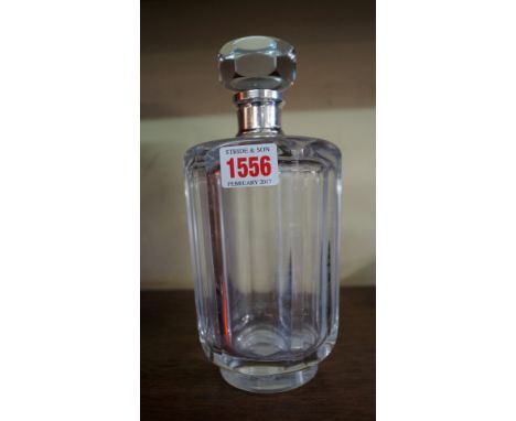 An Orrefors clear glass and silver mounted decanter and stopper.