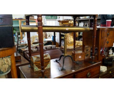 A Victorian lacquered brass library telescope, inscribed 'Broadhurst Clarkson & Co, 63 Farringdon Rd, London EC', on cabriole