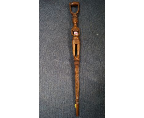 Ethnographica: a carved wood tribal figural walking stick.