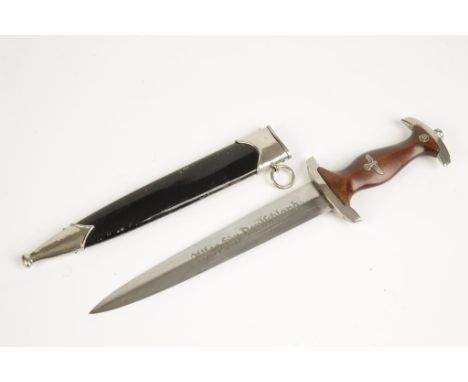 A SECOND WORLD WAR NAZI SA DAGGER, by E & F Horster, Solingen, with engraved blade and scabbard, overall 37cm.