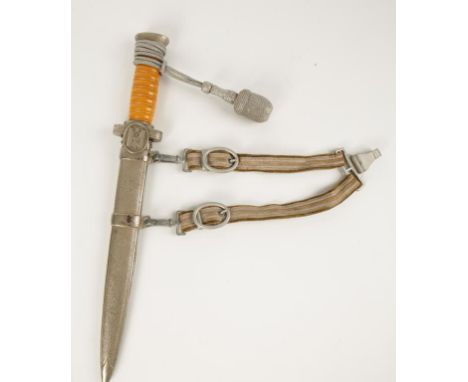 A SECOND WORLD WAR NAZI RED CROSS DAGGER, with scabbard and original velvet and aluminium suspension hook, overall 38cm. 