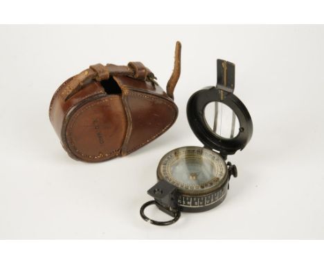 A SECOND WORLD WAR PRISMATIC COMPASS, stamped "CKC/C 31299C Mk. III", in original leather case.