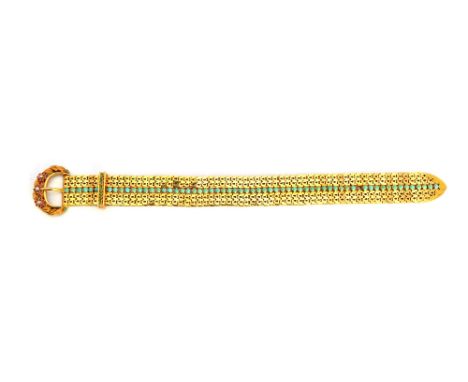 A European gold, turquoise, diamond, ruby and emerald set bracelet, designed as a buckle and strap, the bracelet mounted with