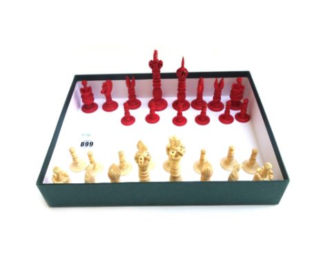 A late 19th century stained ivory chess set of turned and carved form, the King 12cm high (a.f), and a Chinese chinoiserie de