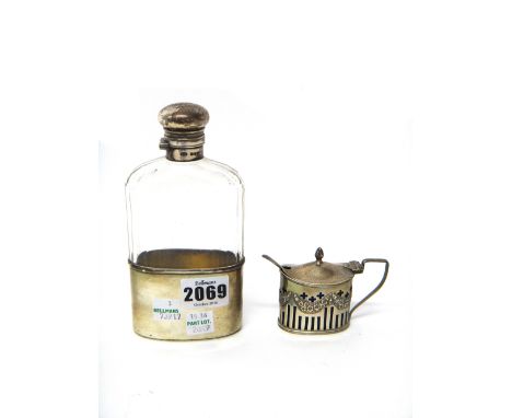 Silver and silver mounted wares, comprising; a Victorian faceted glass spirit flask, with a pull off beaker base, London 1892