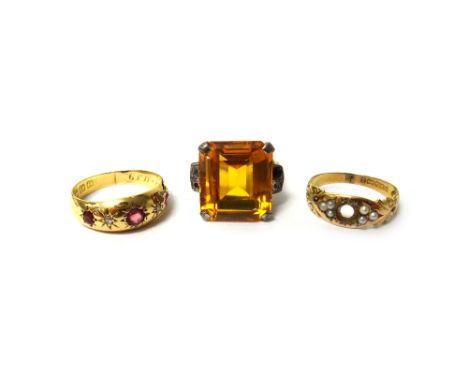 An 18ct gold, ruby and rose diamond set five stone ring, a 9ct gold ring, the centre gemstone lacking, Birmingham 1899 and a 