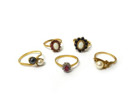 A 9ct gold, opal and sapphire oval cluster ring, a gold, opal and ruby oval cluster ring, detailed 9 CT, a 9ct gold ring, mou