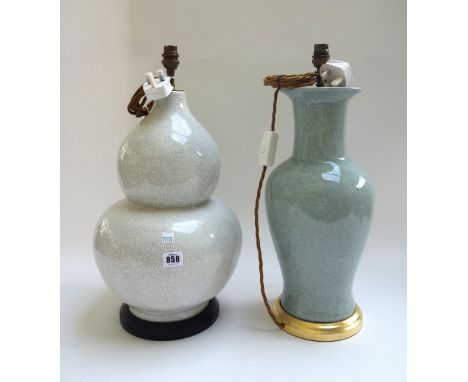 A modern Chinese style pottery table lamp, with off-white crazed decoration against a double gourd body, 43cm high, and anoth