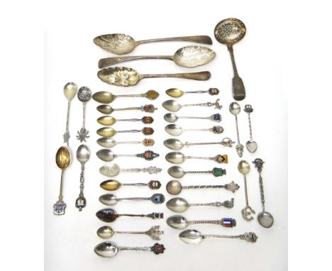 Silver flatware, comprising; two later decorated dessert serving spoons, a bottom marked berry spoon, a fiddle pattern sugar 