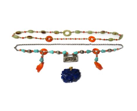 A jade, cornelian and coral necklace, formed as a row of barrel shaped jade links, spaced with coral beads and further fitted